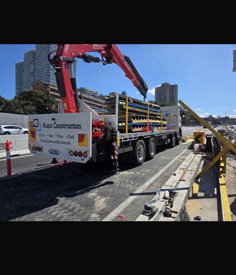 Anno Construction crane truck loading formwork